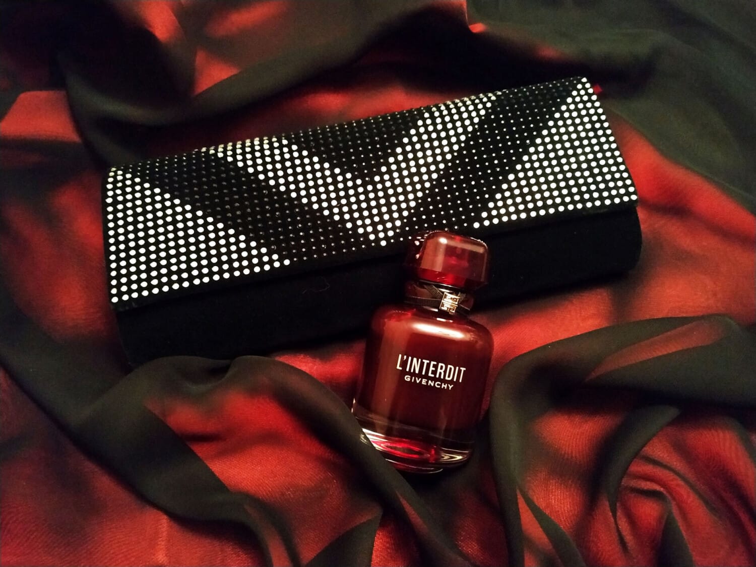L'Interdit Eau de Parfum Rouge, on-skin / lifestyle